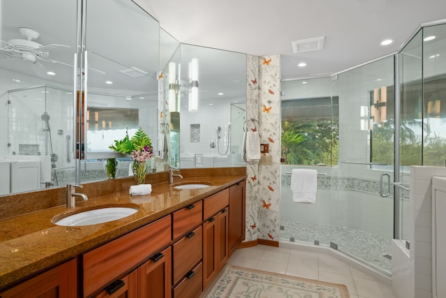 bathroom featuring vanity, tile patterned floors, ceiling fan, and a shower with shower door