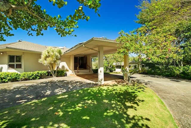 view of front of home with a front yard