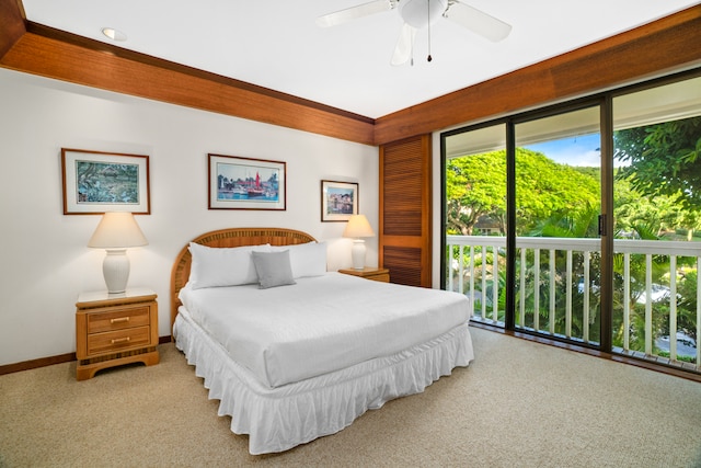 carpeted bedroom with ceiling fan and access to exterior