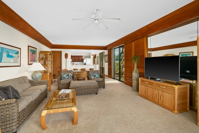 living room featuring light carpet and ceiling fan