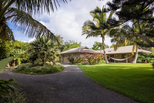 view of front facade with a front lawn