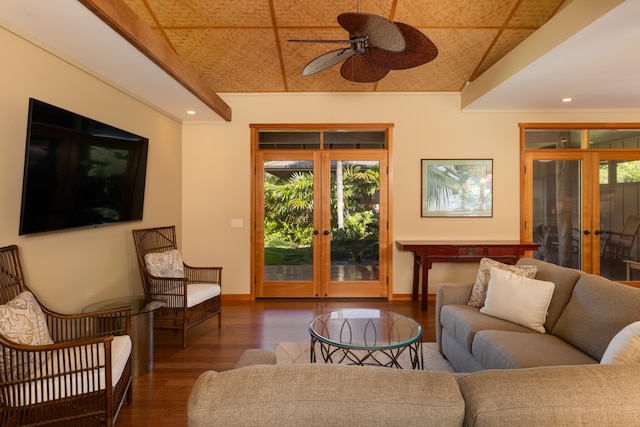 living room featuring french doors, plenty of natural light, and dark wood-type flooring