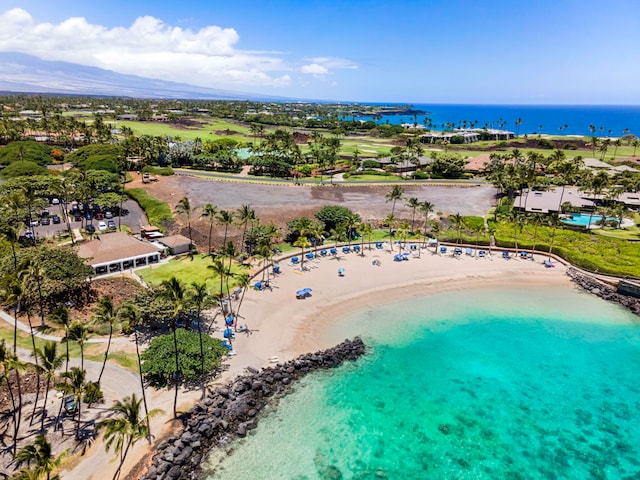 bird's eye view with a water view and a view of the beach