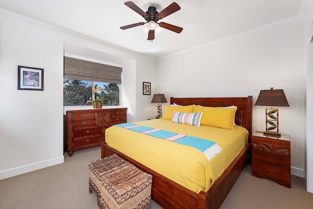 bedroom featuring ceiling fan, light carpet, and ornamental molding