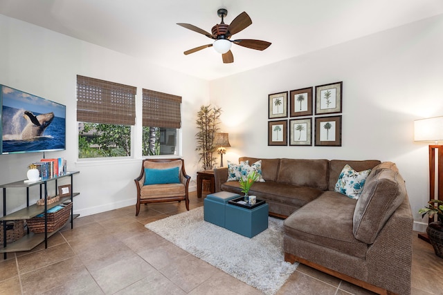 living room with tile patterned floors and ceiling fan