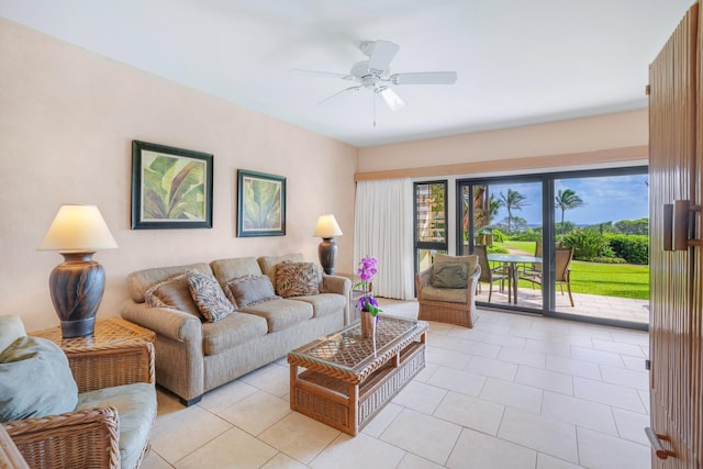 living room with ceiling fan and light tile patterned floors