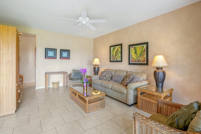 living room featuring ceiling fan and light tile patterned floors