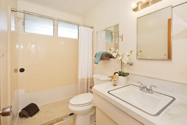 bathroom featuring vanity, toilet, and a shower with shower curtain