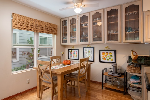 dining area featuring ceiling fan, a healthy amount of sunlight, and light hardwood / wood-style floors