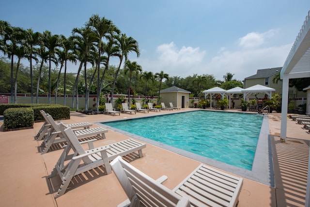 view of pool featuring a gazebo and a patio area