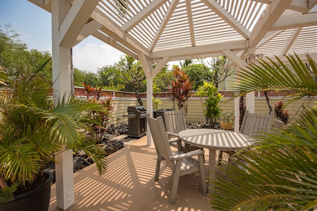 view of patio / terrace featuring a grill and a pergola