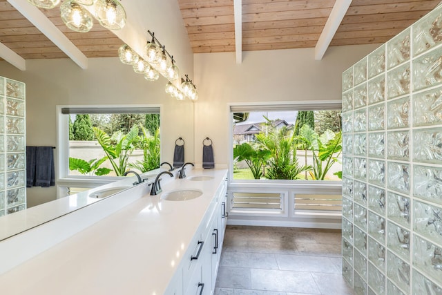 bathroom featuring wood ceiling, tile patterned floors, and lofted ceiling with beams