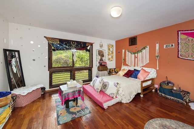 bedroom featuring hardwood / wood-style floors