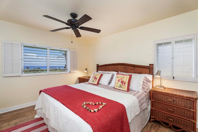 bedroom featuring hardwood / wood-style floors and ceiling fan