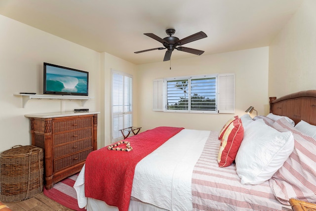 bedroom featuring ceiling fan and light hardwood / wood-style floors