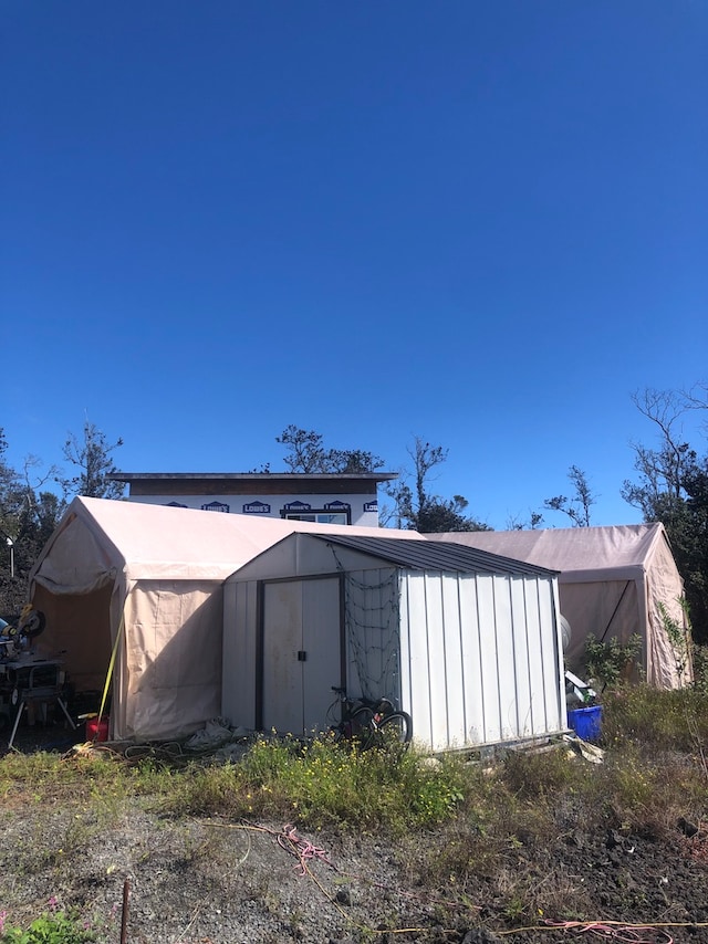 exterior space with a storage unit