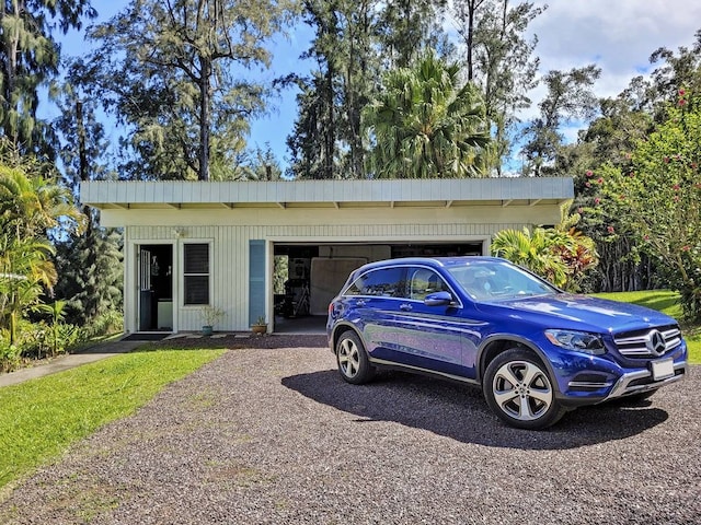 single story home with a garage