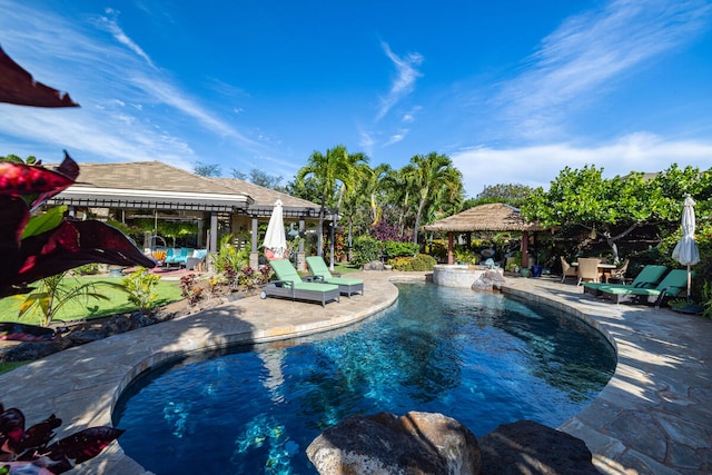 view of pool featuring a gazebo and a patio