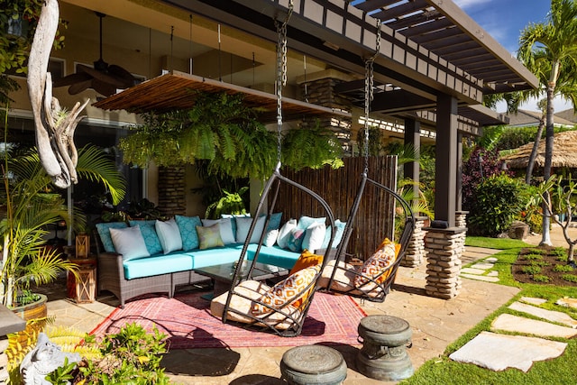 view of patio featuring an outdoor living space, ceiling fan, and a pergola