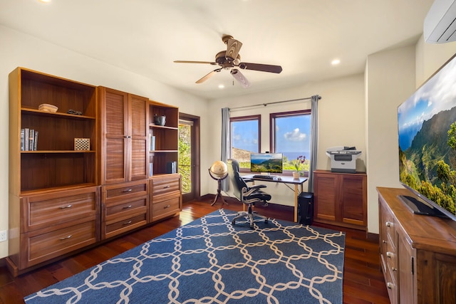 office featuring a wall mounted AC, ceiling fan, and dark hardwood / wood-style floors