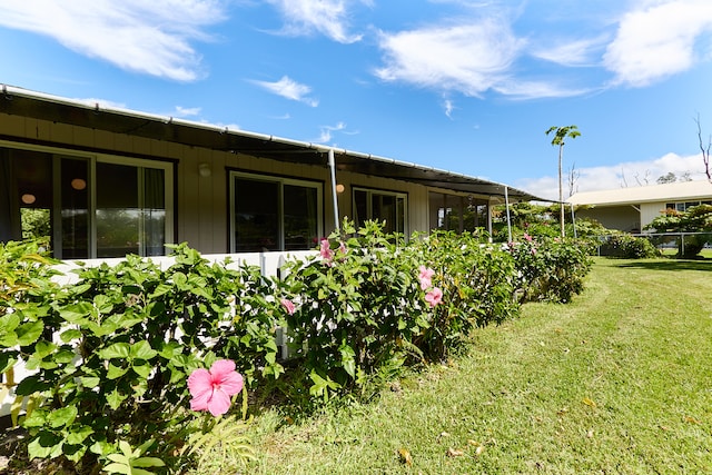 exterior space featuring a lawn