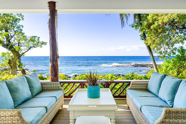 balcony featuring a water view