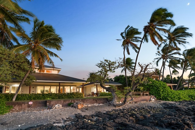 view of property exterior at dusk