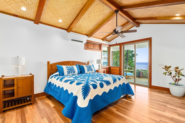 bedroom with access to exterior, ceiling fan, lofted ceiling with beams, an AC wall unit, and light wood-type flooring