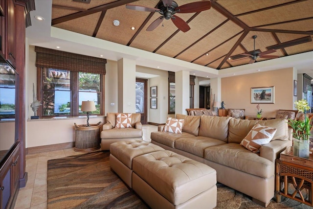 tiled living room featuring vaulted ceiling and ceiling fan