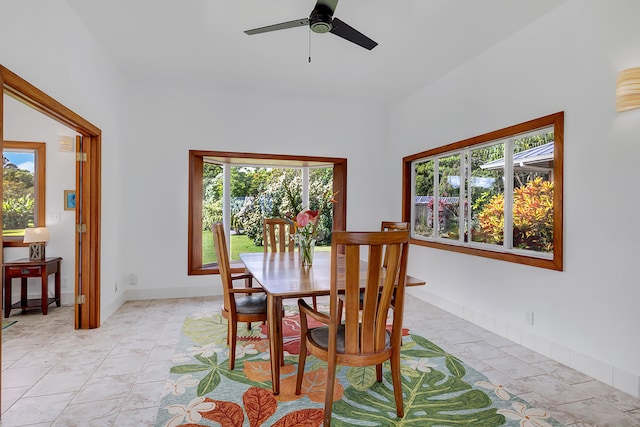 dining space featuring ceiling fan