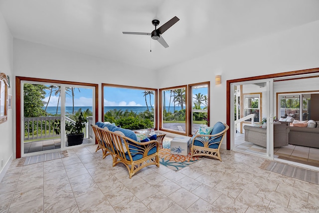 sunroom with ceiling fan and a healthy amount of sunlight