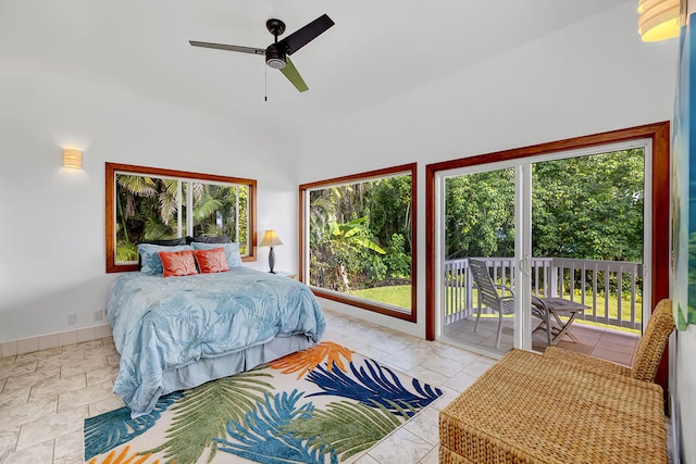 bedroom with ceiling fan and access to outside