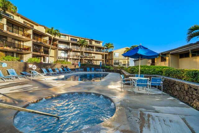 view of swimming pool with a patio