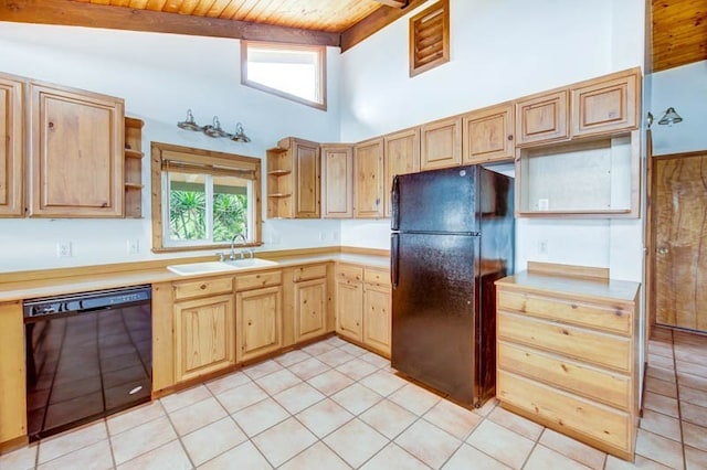 kitchen featuring lofted ceiling with beams, black appliances, a healthy amount of sunlight, and wooden ceiling