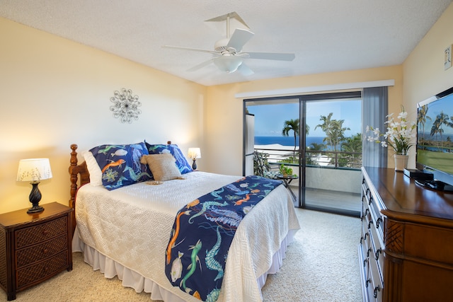 bedroom with light carpet, a textured ceiling, access to outside, and ceiling fan