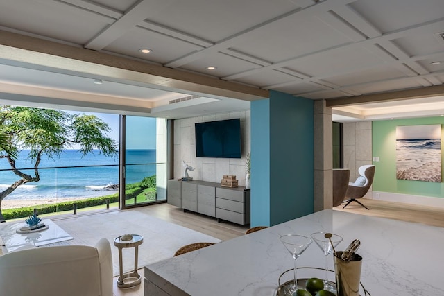 bedroom with light hardwood / wood-style flooring and coffered ceiling