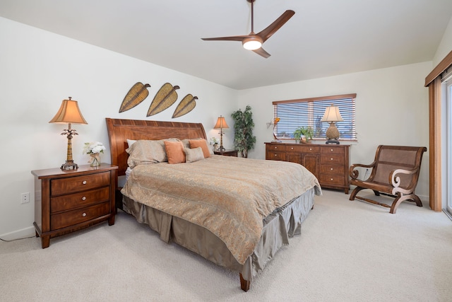 bedroom featuring light carpet and ceiling fan