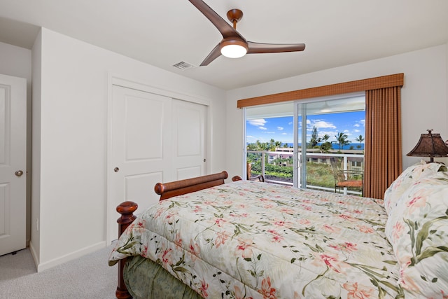 bedroom featuring carpet flooring, ceiling fan, and a closet