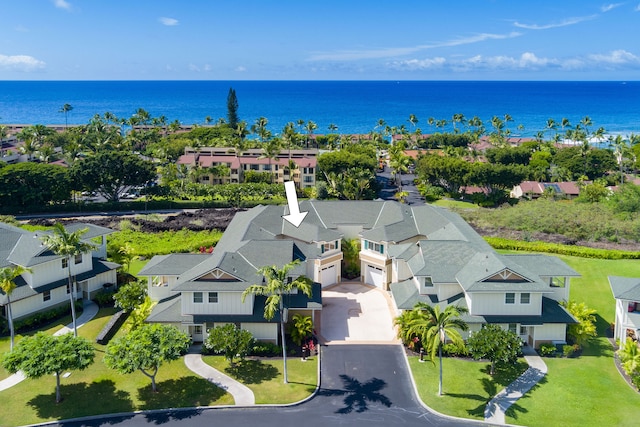 bird's eye view with a water view