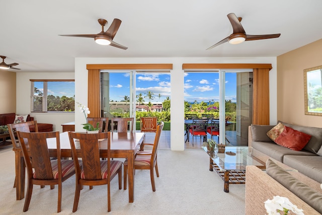 dining room featuring ceiling fan