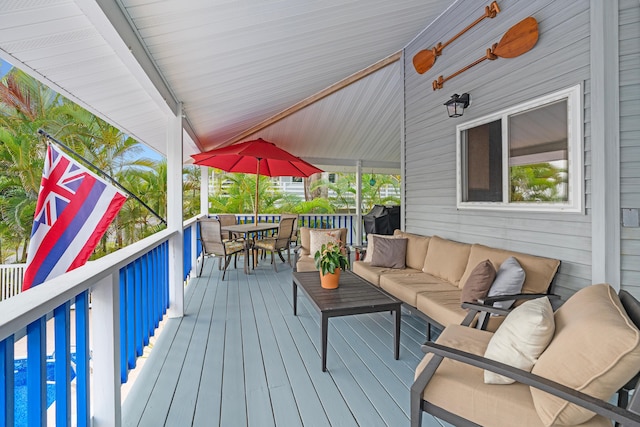 wooden deck with an outdoor hangout area