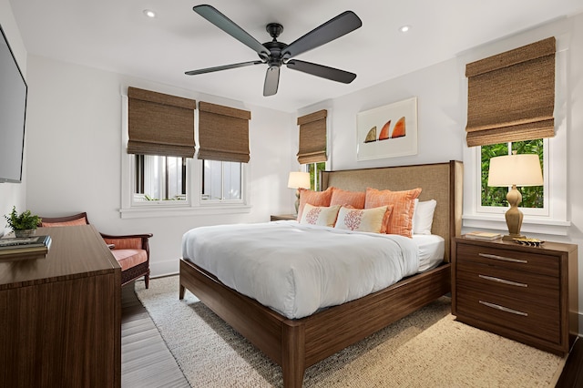 bedroom featuring ceiling fan and light wood-type flooring