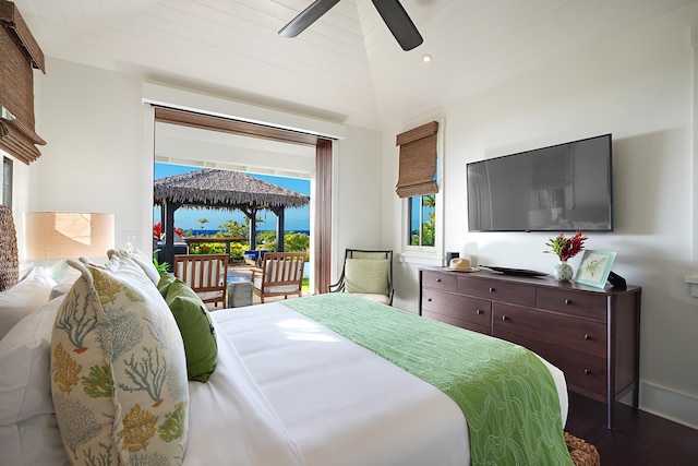 bedroom with wood-type flooring, access to outside, and ceiling fan