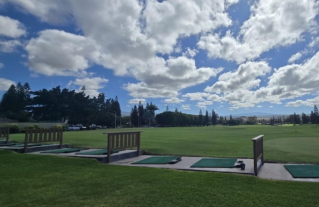 surrounding community with a yard