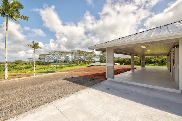 exterior space featuring a carport