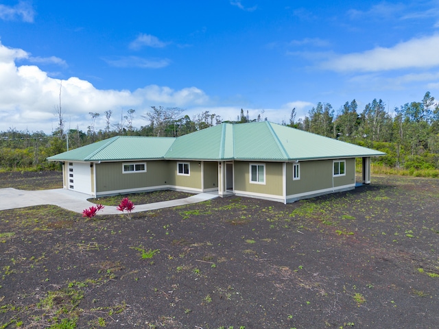 ranch-style house featuring a garage