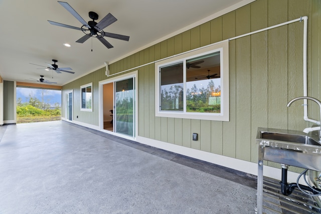 view of patio with ceiling fan