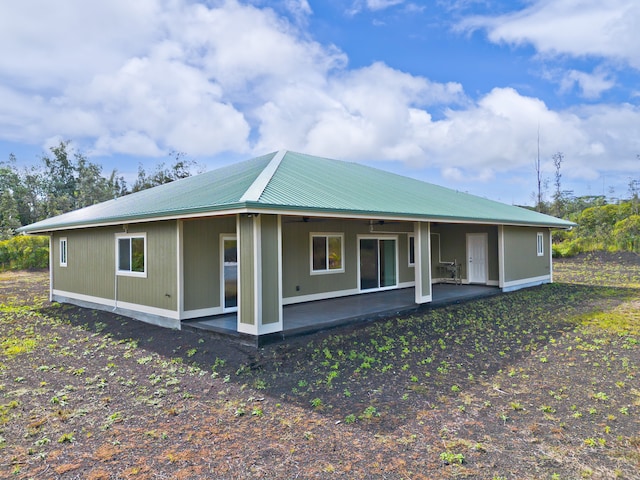 back of house featuring a patio