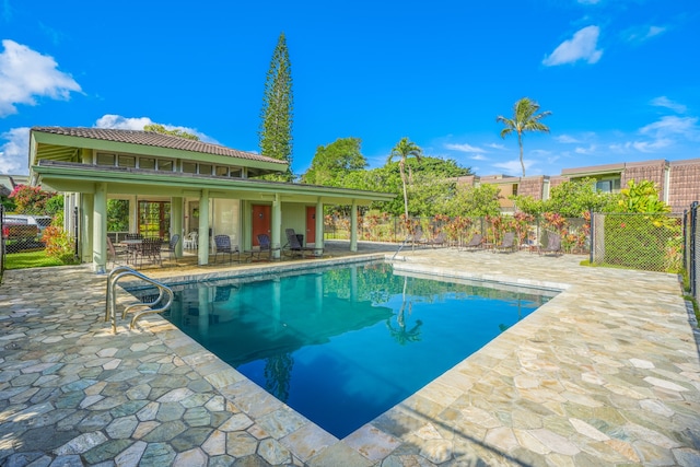 view of pool featuring a patio area