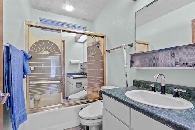 full bathroom with vanity, toilet, enclosed tub / shower combo, and a textured ceiling